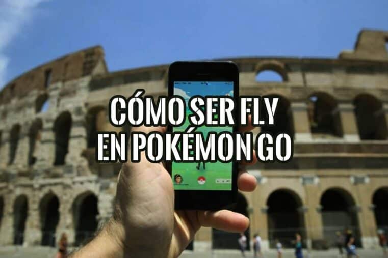Mano con un móvil jugando a Pokémon GO frente al Coliseo de Roma, con el texto «Cómo ser fly en Pokémon GO»