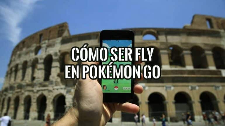 Mano con un móvil jugando a Pokémon GO frente al Coliseo de Roma, con el texto «Cómo ser fly en Pokémon GO»