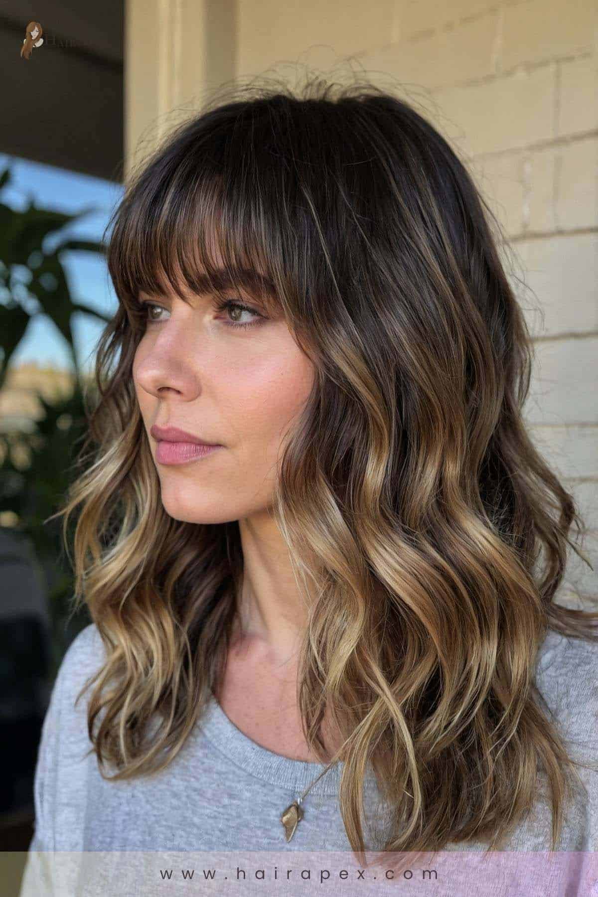 medium length haircut with curtain bangs 21