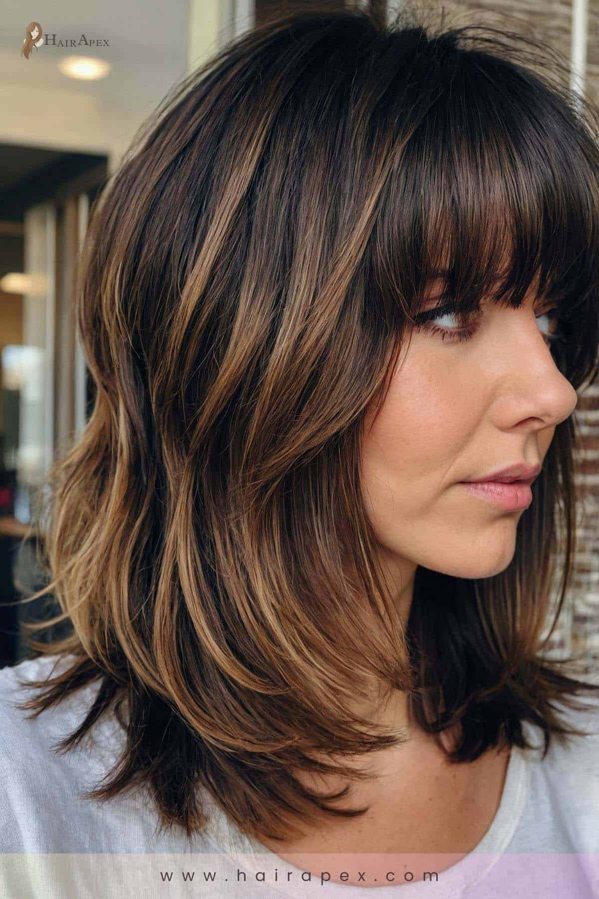 medium length haircut with curtain bangs 2