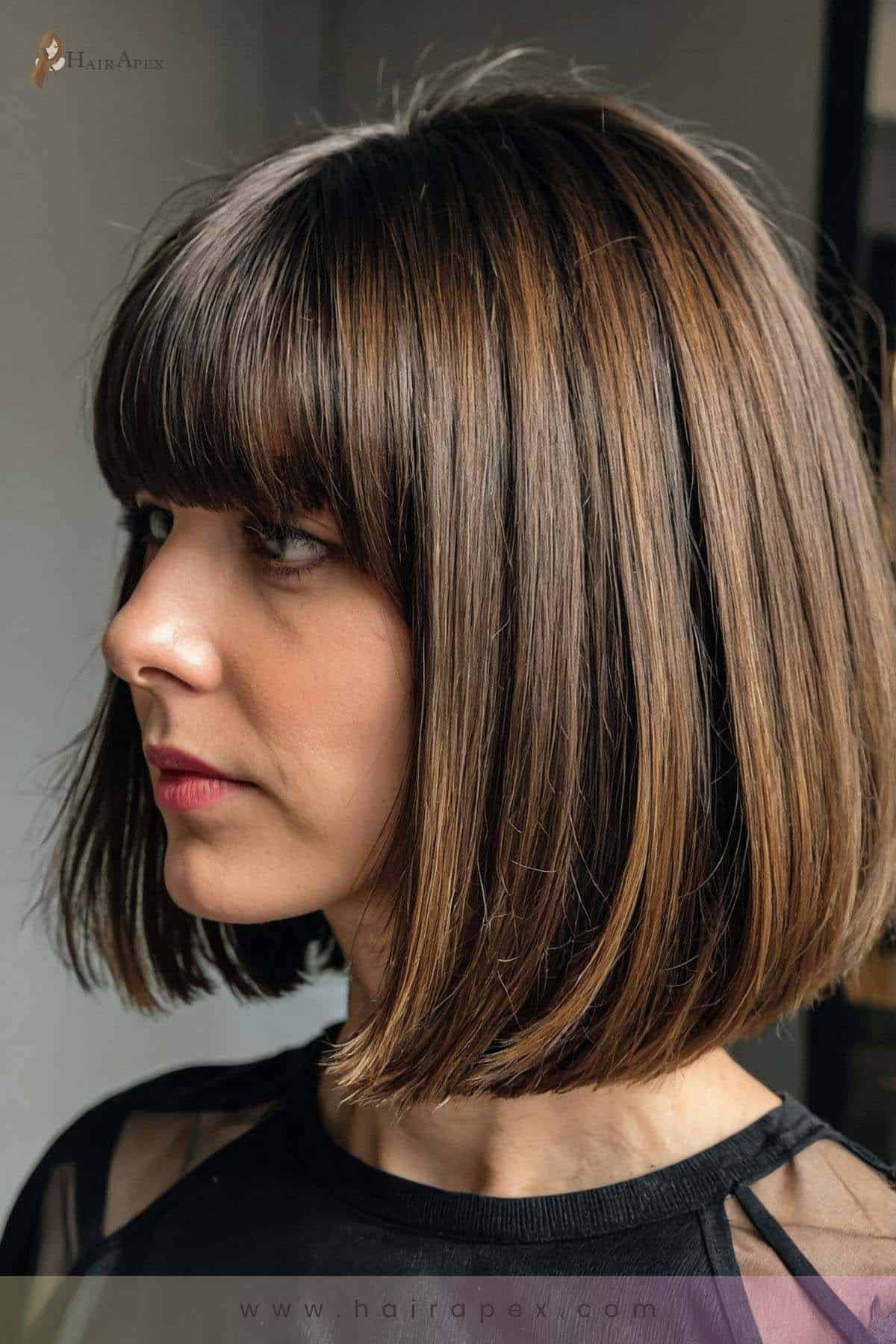 medium length haircut with curtain bangs 12