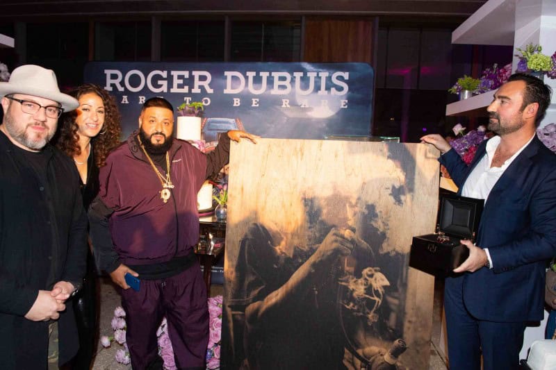 Jonathan Mannion and DJ Khaled with Nicolas Marion