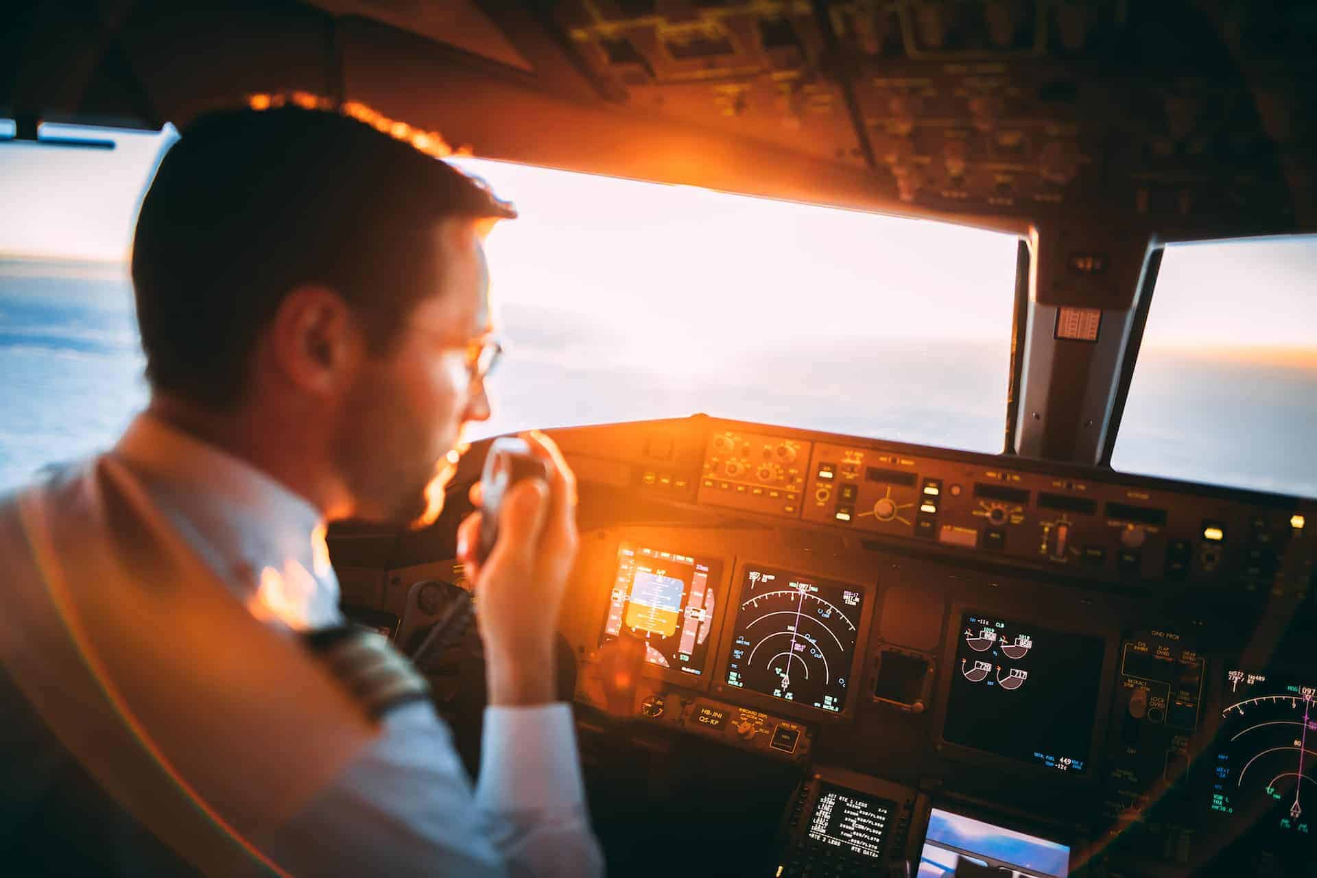 A pilot wearing sunscreen in the cockpit