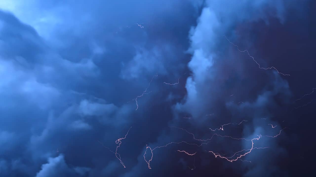 Thunderstorms accompanied with lightning in the sky