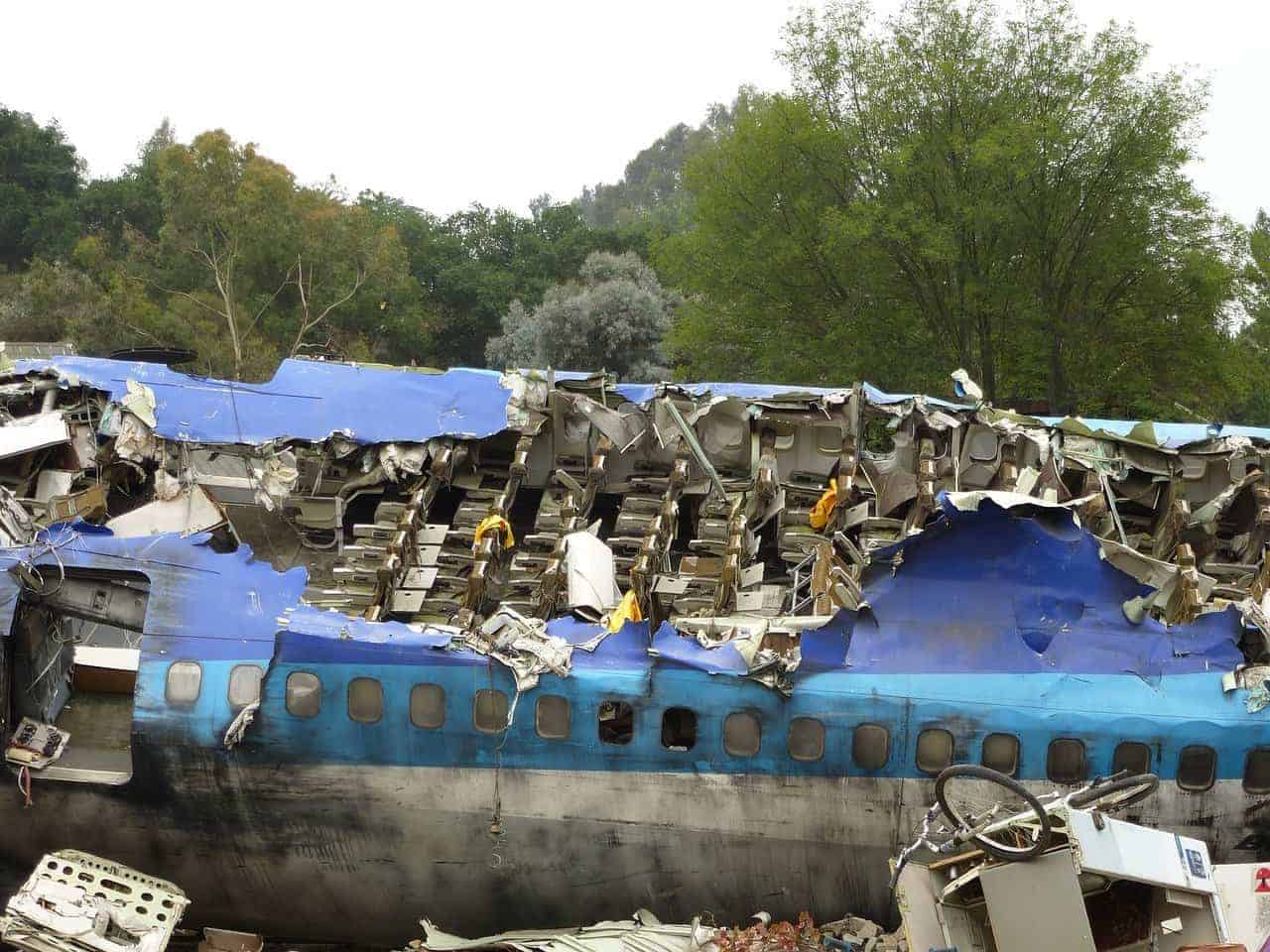A severely damaged plane in the aftermath of a plane crash