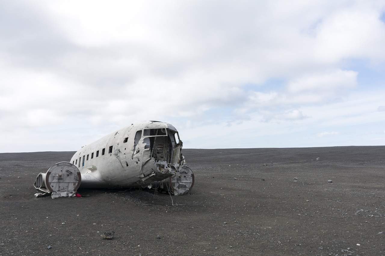 Part of a plane on the ground after a crash