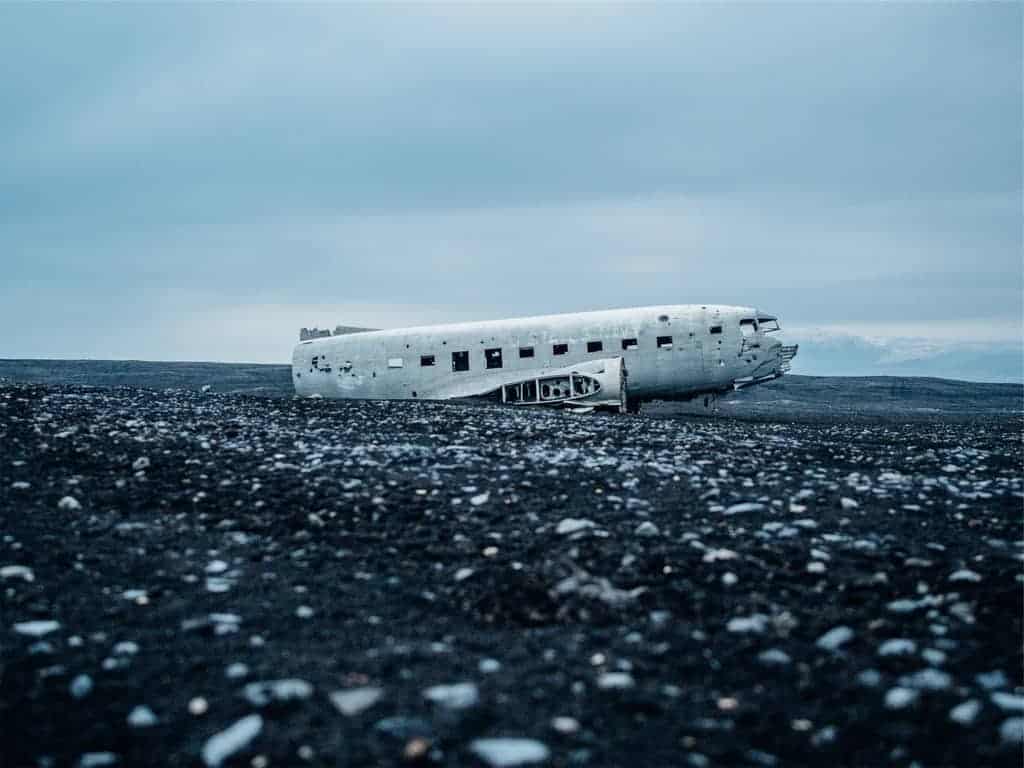 A part of a plane on the ground after it crashed