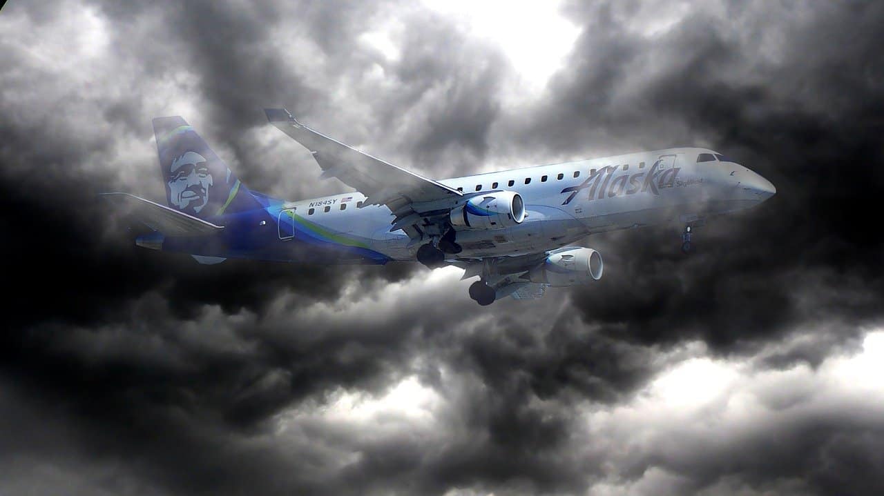 A plane flying in turbulent skies