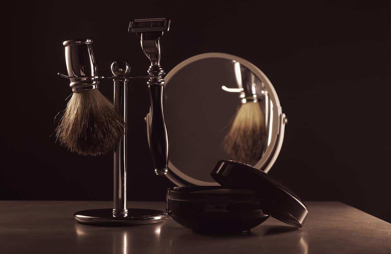 Shaving cream, brush and a mirror