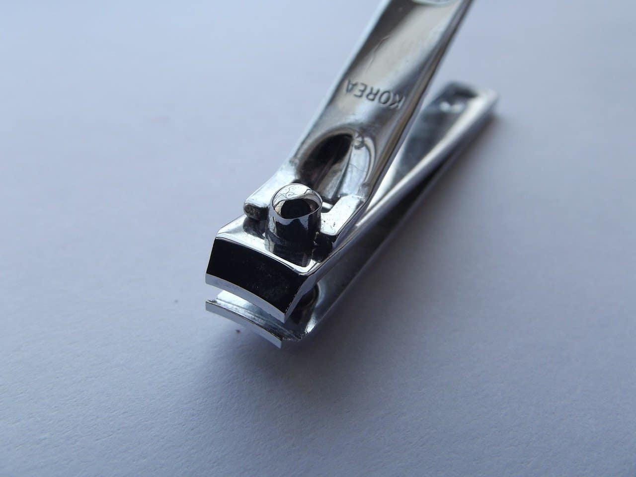 Stainless steel nail clippers on a table