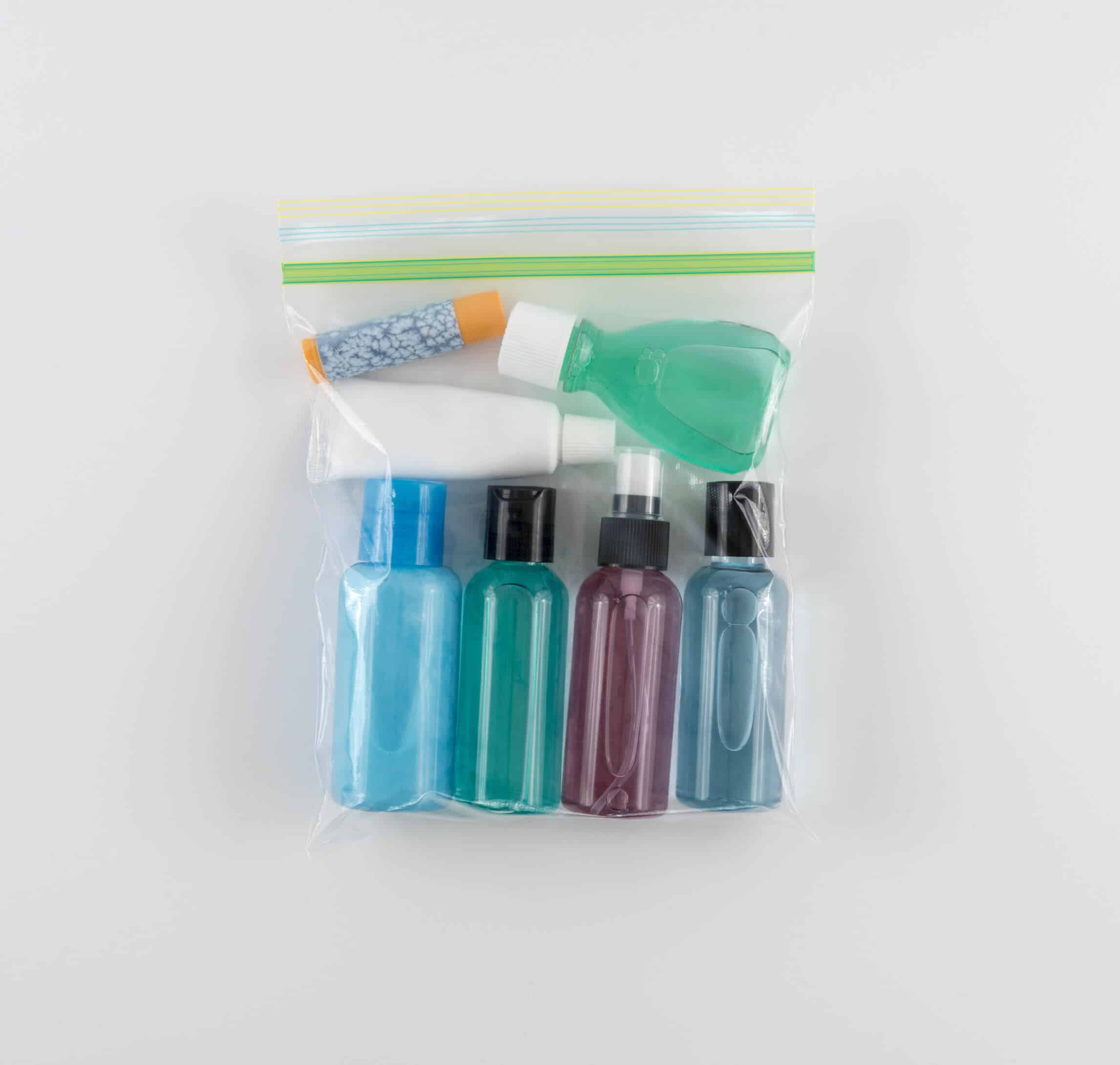 6 containers of liquids in a clear, resealable bag