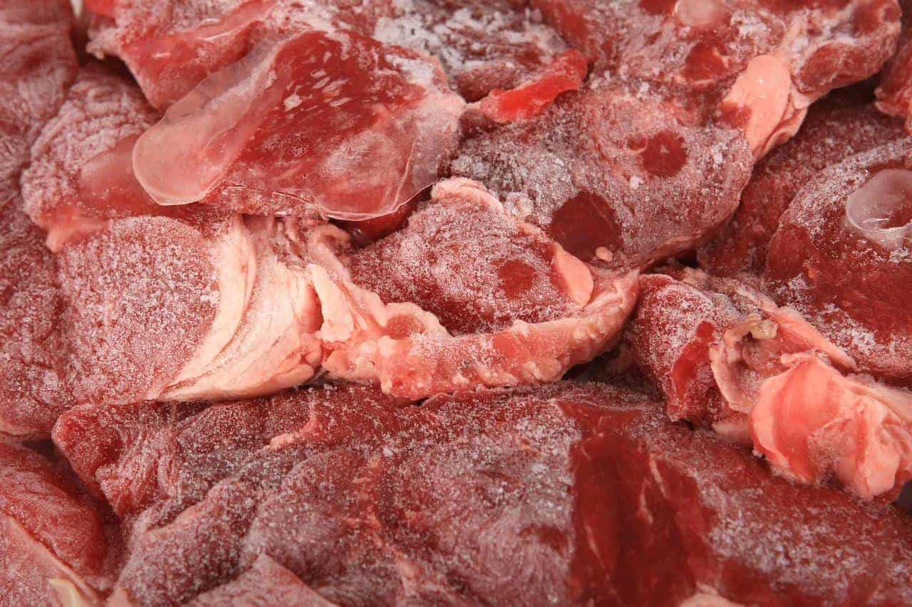 Frozen meat laid out on a table