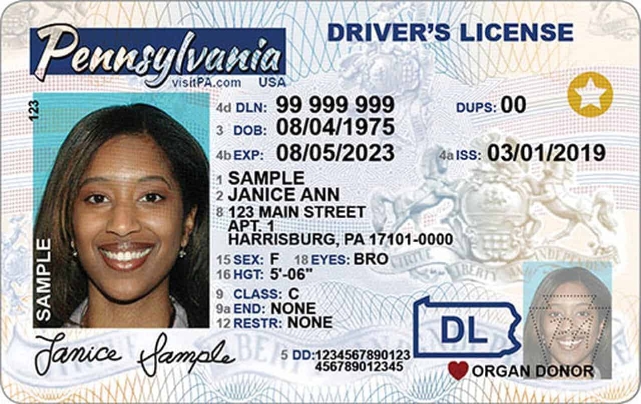 A woman's driver's license with Real ID