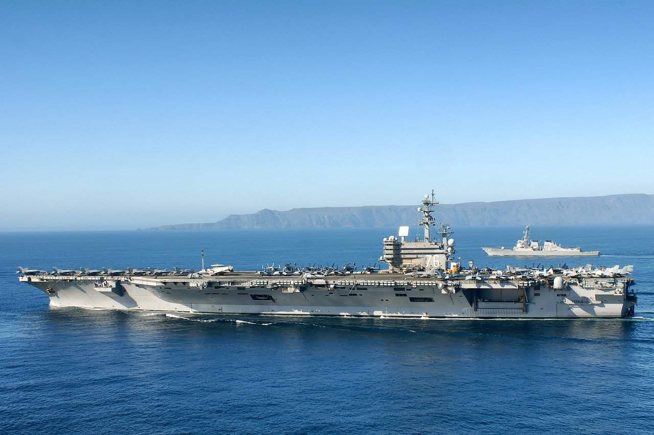 Two aircraft carriers sailing in the ocean