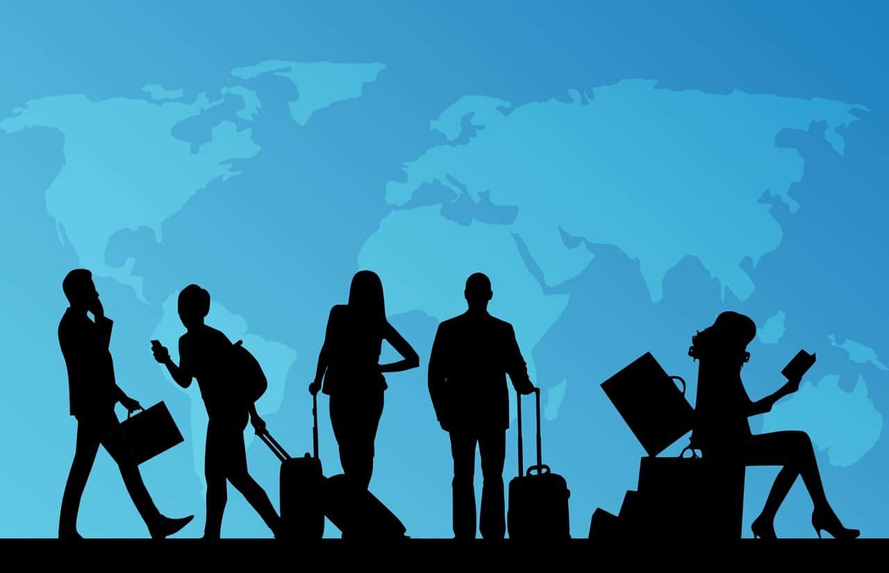 A clipart image of 5 passengers against a world map as a backdrop