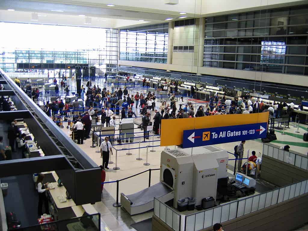 passengers transiting through a busy airport