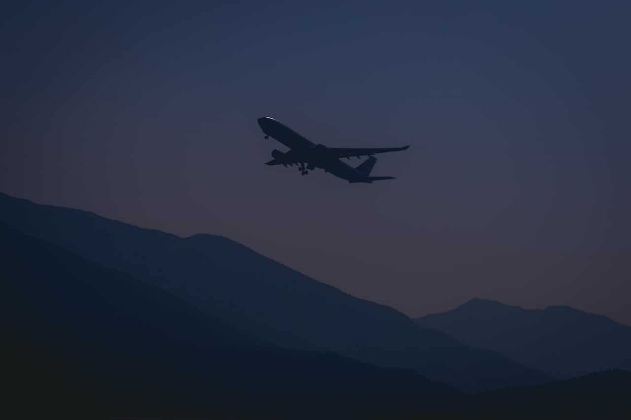 Ailine pilot flying at night during a long-haul flight