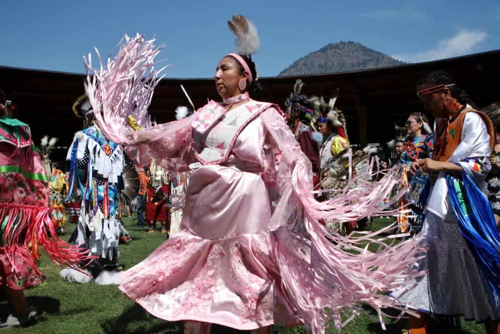 Dancers participate in the grand entry of the second day of the 41st Kamloopa Powwow in Tk’emlúps (Kamloops) in Secwépemc homelands on July 30. Photo by Aaron Hemens