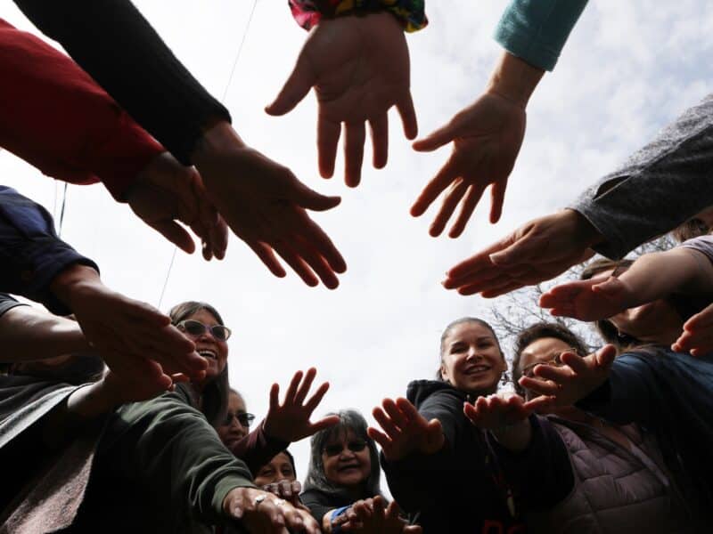 Participants of the second annual 13 Moons program gather in a circle following a three-day retreat in syilx homelands on May 7 that capped off this year’s programming. Photo by Aaron Hemens
