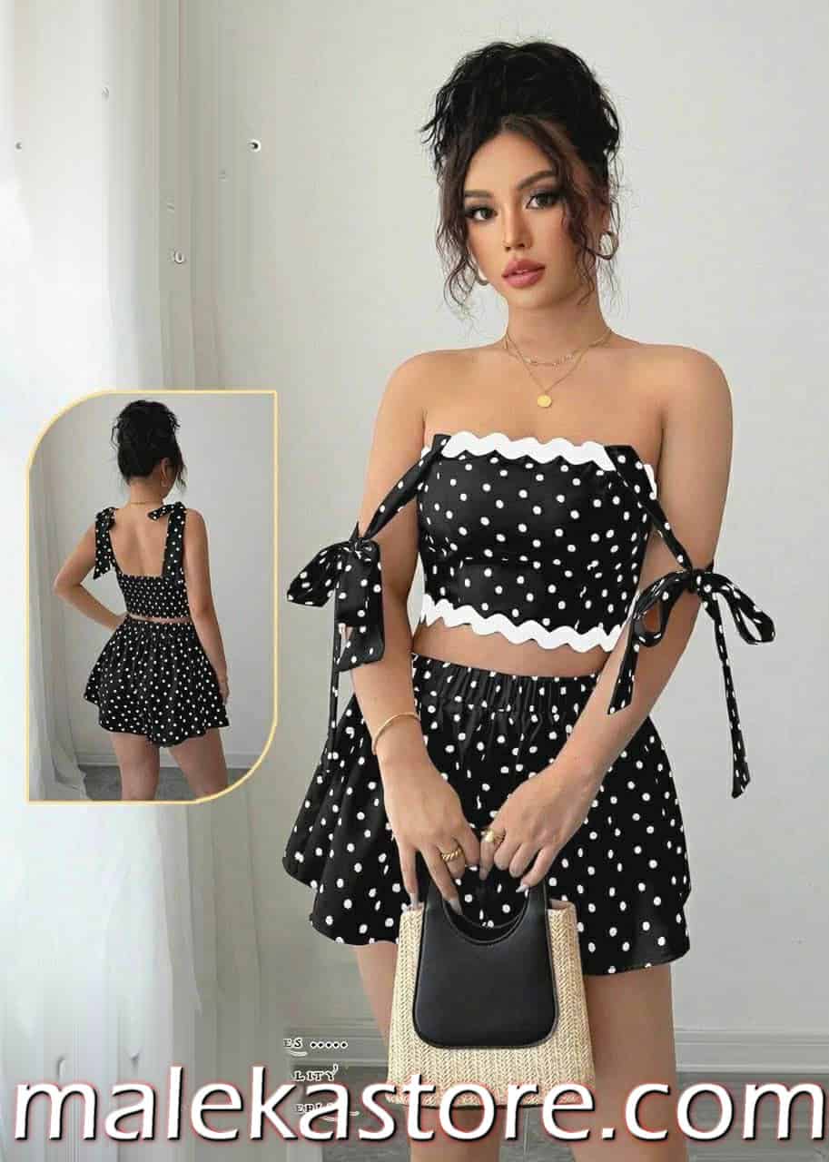 0155 black تاة ترتدي طقم صيفي بنقشة منقطة أنيق يظهر بوضوح في الملف 0155 b.jpg.