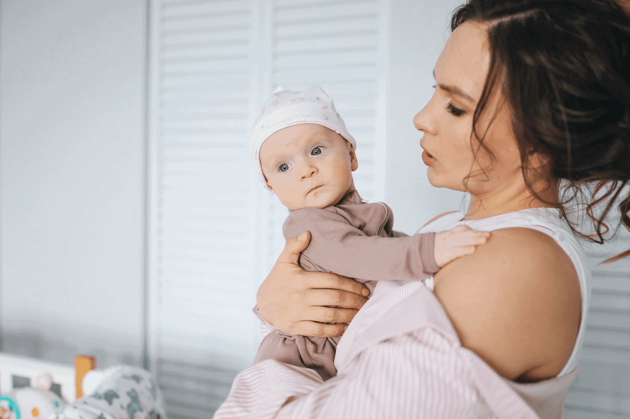 mother holding little baby