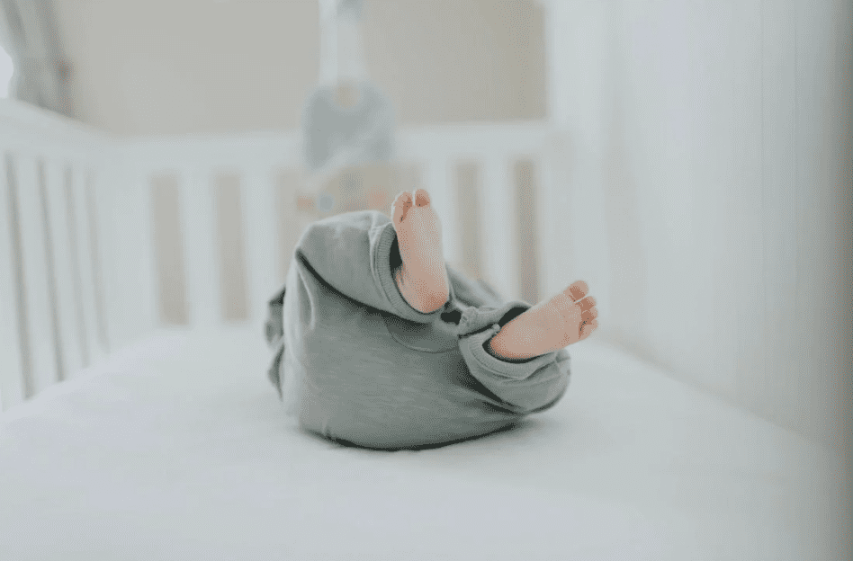 baby sleeping in crib