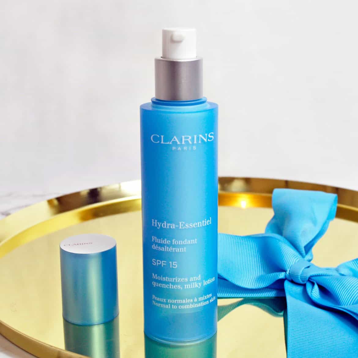 Clarins Hydra-Essentiel Moisturizes and Quenches Milky Lotion SPF15 لوشن ترطيبي هايدرا إسنتيل SPF15 للبشرة العادية إلى المختلطة من كلارنس - الصورة 1