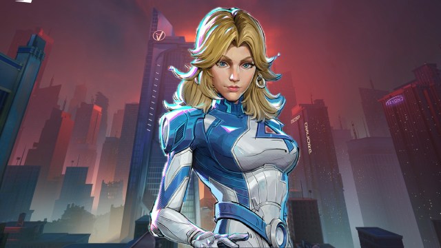 Sue Storm poses against a backdrop of the Baxter Building at night