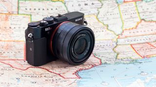 The Sony RX1R II camera sitting on a map
