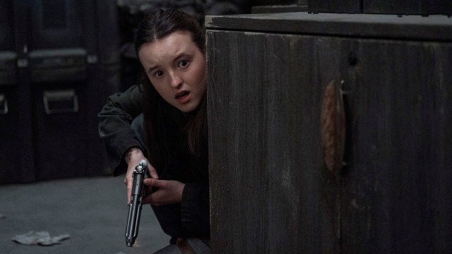 Ellie looking worried from behind a cupboard in The Last of Us season 2 episode 4