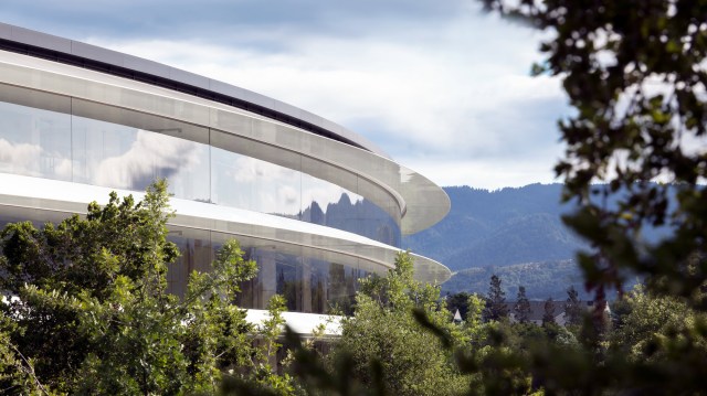 A photo of Apple Park surrounded by trees