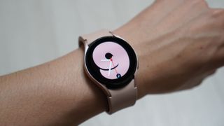 Person wearing the Galaxy Watch 4 on their wrist