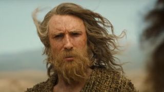 The Stranger stares at an off-camera Tom Bombadil in The Rings of Power season 2