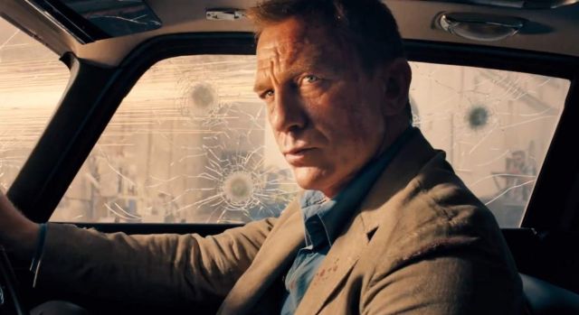 Daniel Craig as James Bond in a car