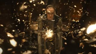 A Mystic casts a spell in a dimly lit area in The Rings of Power season 2