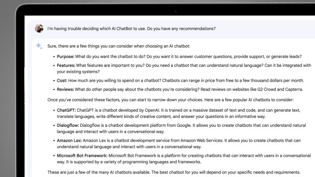 A laptop screen on a grey background showing a conversation with Google Bard