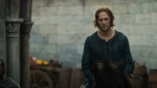 Sauron rides on horseback through Numenor's streets in The Rings of Power season 2