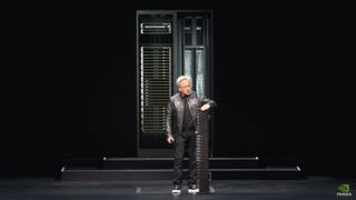 Nvidia CEO Jensen Huang at Nvidia's pre-Computex 2024 keynote showing off Nvidia Blackwell