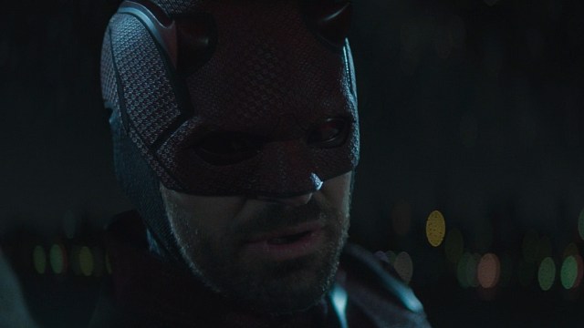 A close up of Daredevil looking at an off-camera Karen Page in Daredevil: Born Again episode 9