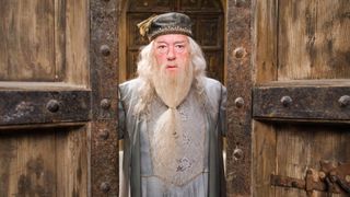 Dumbledore stands inbetween two doors in Harry Potter