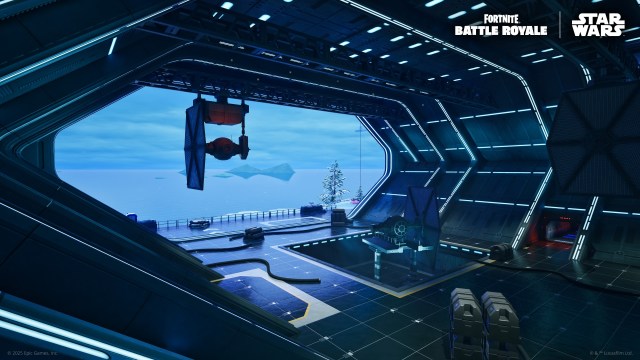 A TIE Fighter being built in a First Order hangar