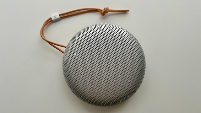 Bang & Olufsen Beosound A1 3rd Generation in silver, on gray table