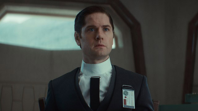 Syril Karn wearing an ISB suit in Andor season 2