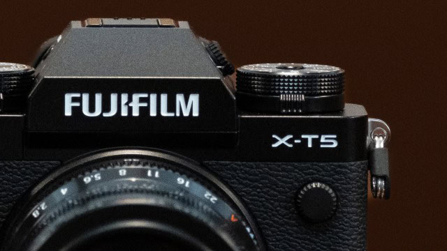 The Fujifilm X-T5 camera sitting on a table