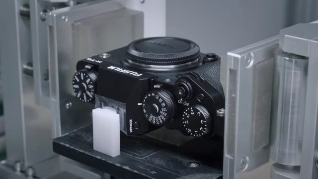 A Fujifilm X-T5 being assembled in a factory