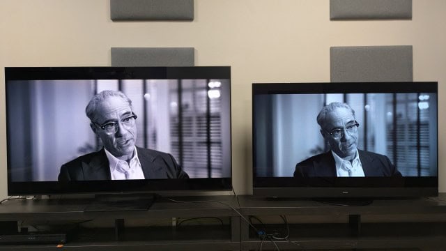 TCL C7K mini-LED left and Panasonic MZ1500 OLED right displaying Admiral Strauss from Oppenheimer on screen 
