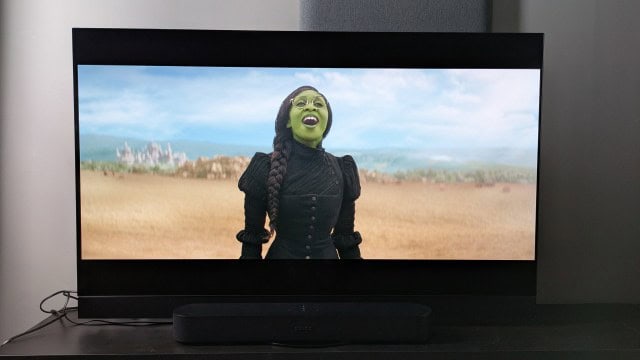 Sonos Beam connected to Panasonic Mz1500 displaying Wicked on screen