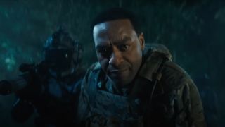Orwell Taylor glances down at someone in Venom: The Last Dance