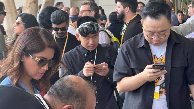 People at Apple Campus wearing Apple Vision Pro