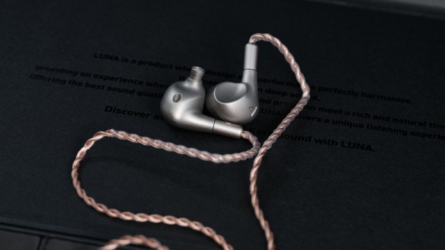 Astell & Kern Luna IEMs photographed on a black background
